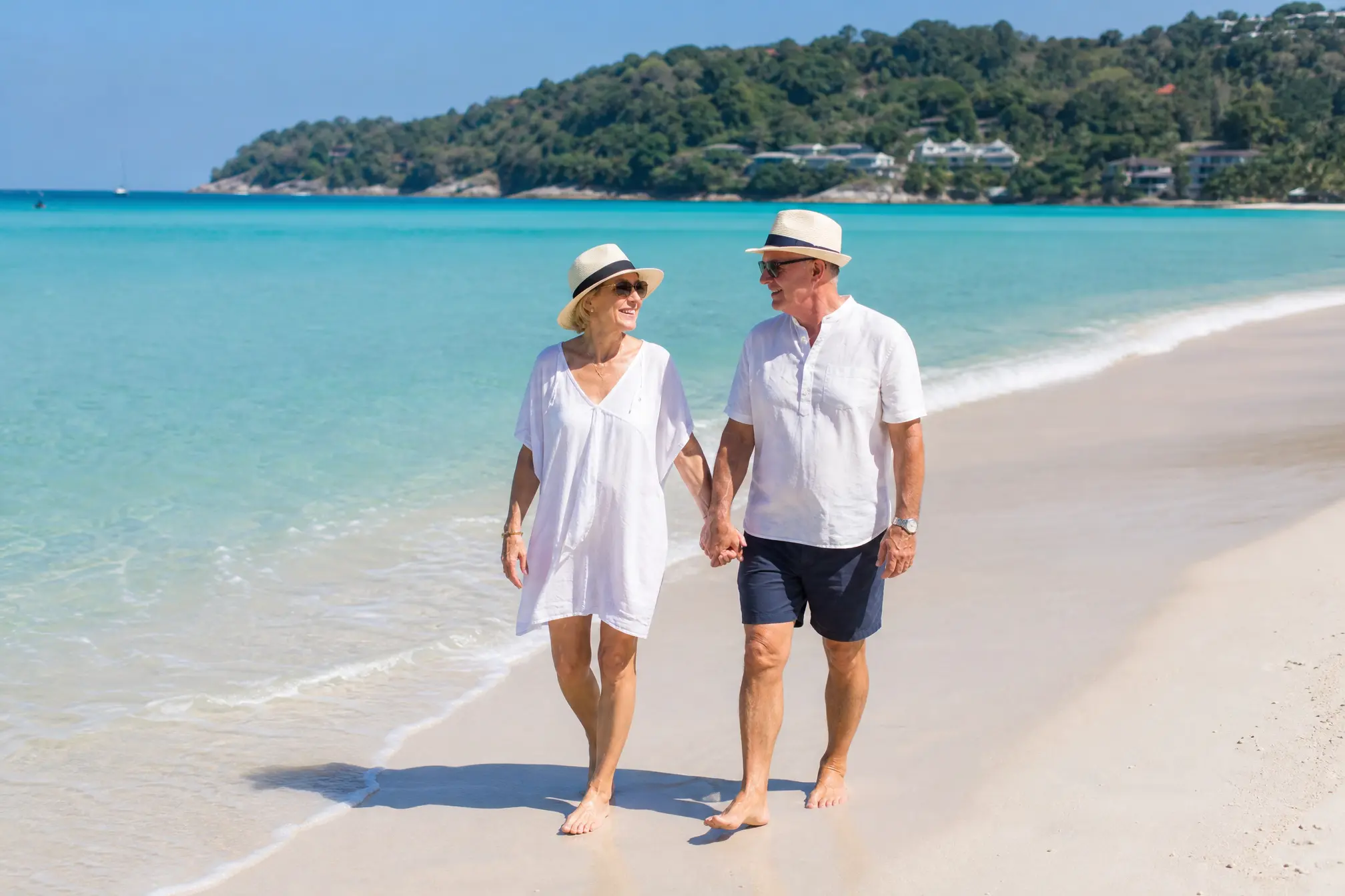 Australian retired couple at Phuket beach Thailand destination